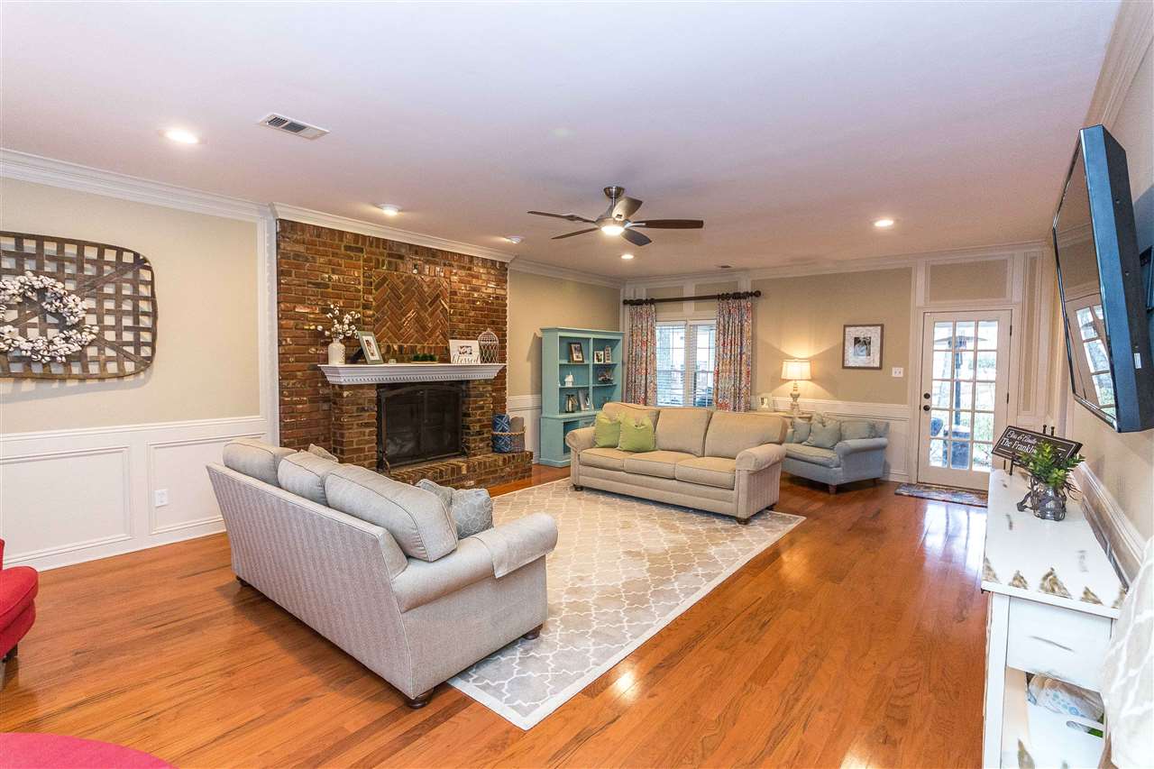 1211 Frank Road Collierville, TN 38017 - Photo 9 of 23 Large great room allows room for many to enjoy family events around the fireplace.