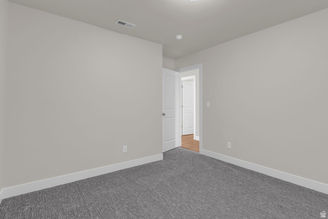 578 West 7th Midvale, UT 84047 - Photo 18 of 35 Empty room with carpet flooring and baseboards