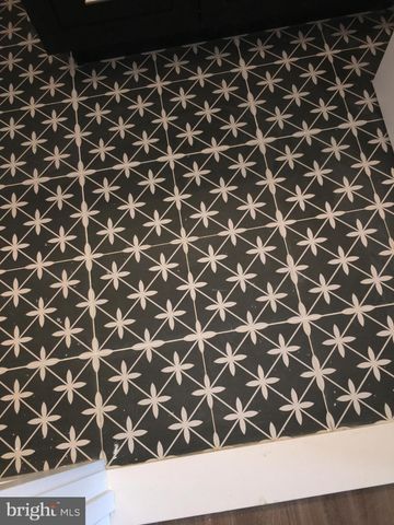 view of a black and white cabinet