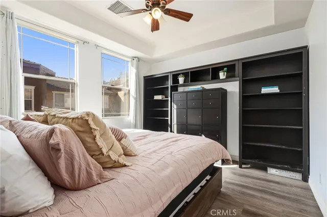 a bedroom with a bed and a walk in closet