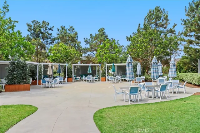 a view of a park with swings and slides