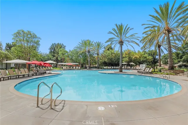 a view of a swimming pool with a patio