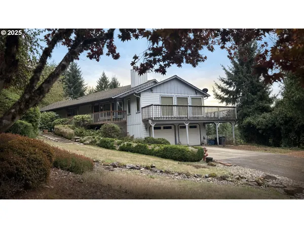 a black and white photo of a house