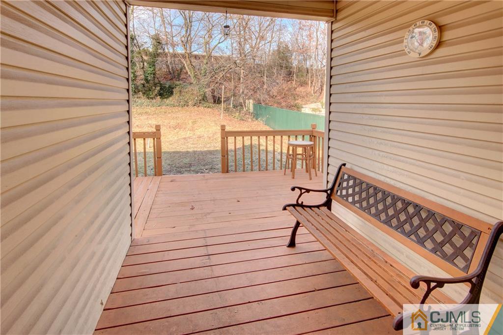 38 Tunison Road New Brunswick, NJ 08901 - Photo 13 of 18 a view of a balcony with wooden floor