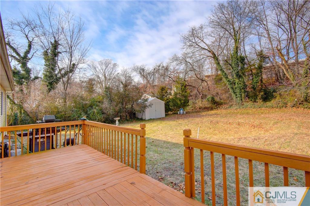 38 Tunison Road New Brunswick, NJ 08901 - Photo 14 of 18 a view of a balcony with wooden fence