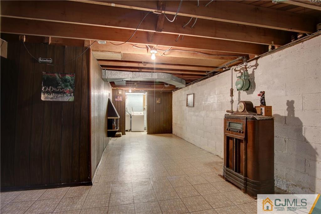 38 Tunison Road New Brunswick, NJ 08901 - Photo 17 of 18 a view of a hallway with wooden walls