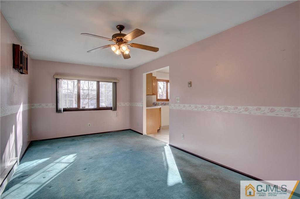38 Tunison Road New Brunswick, NJ 08901 - Photo 6 of 18 a view of an empty room with a window