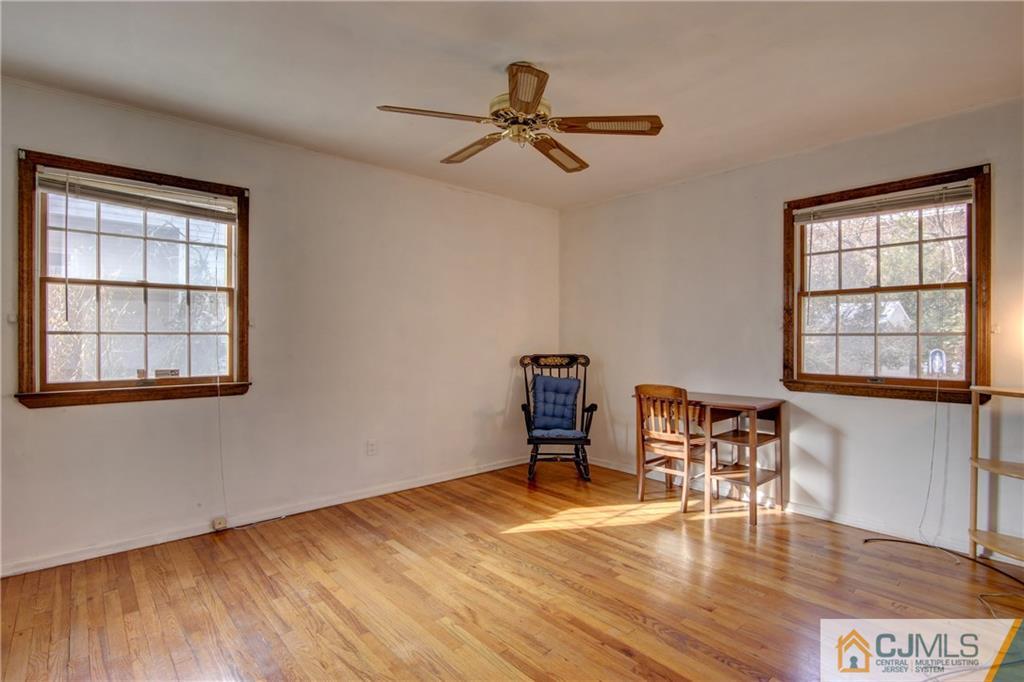38 Tunison Road New Brunswick, NJ 08901 - Photo 8 of 18 a view of a livingroom with furniture and hardwood floor