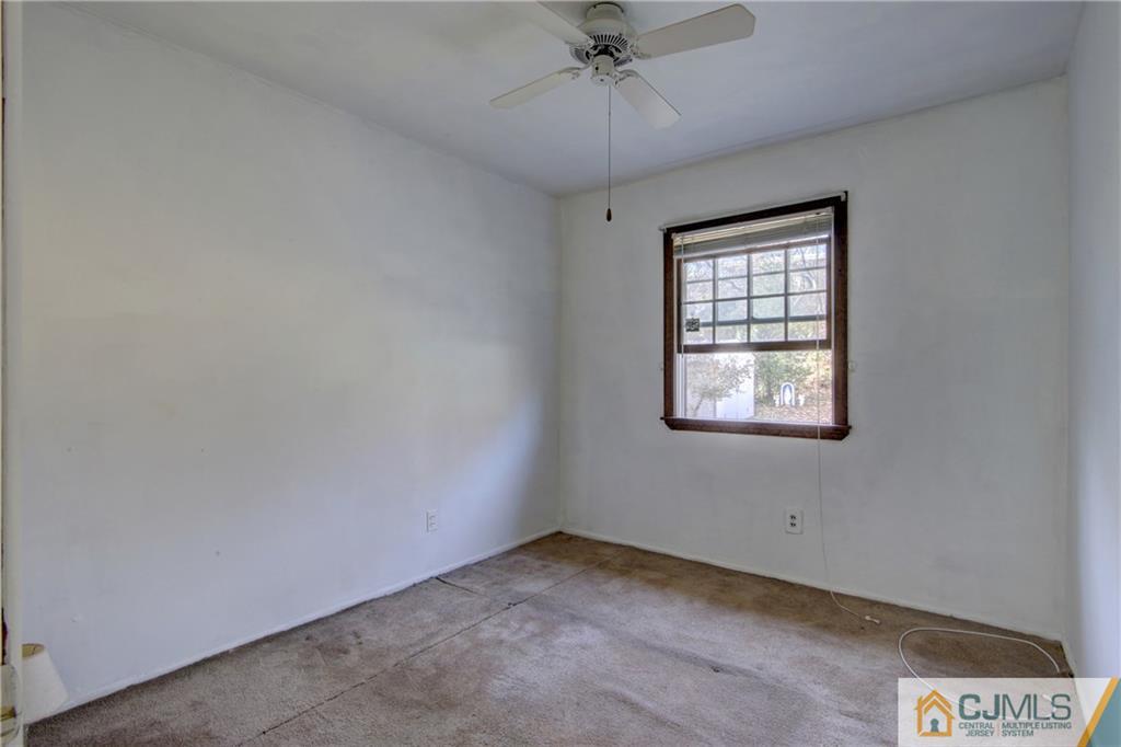 38 Tunison Road New Brunswick, NJ 08901 - Photo 10 of 18 an empty room with a window