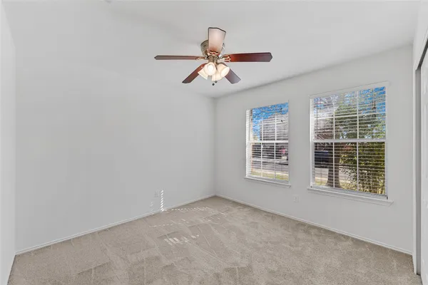 a workspace with furniture and a window