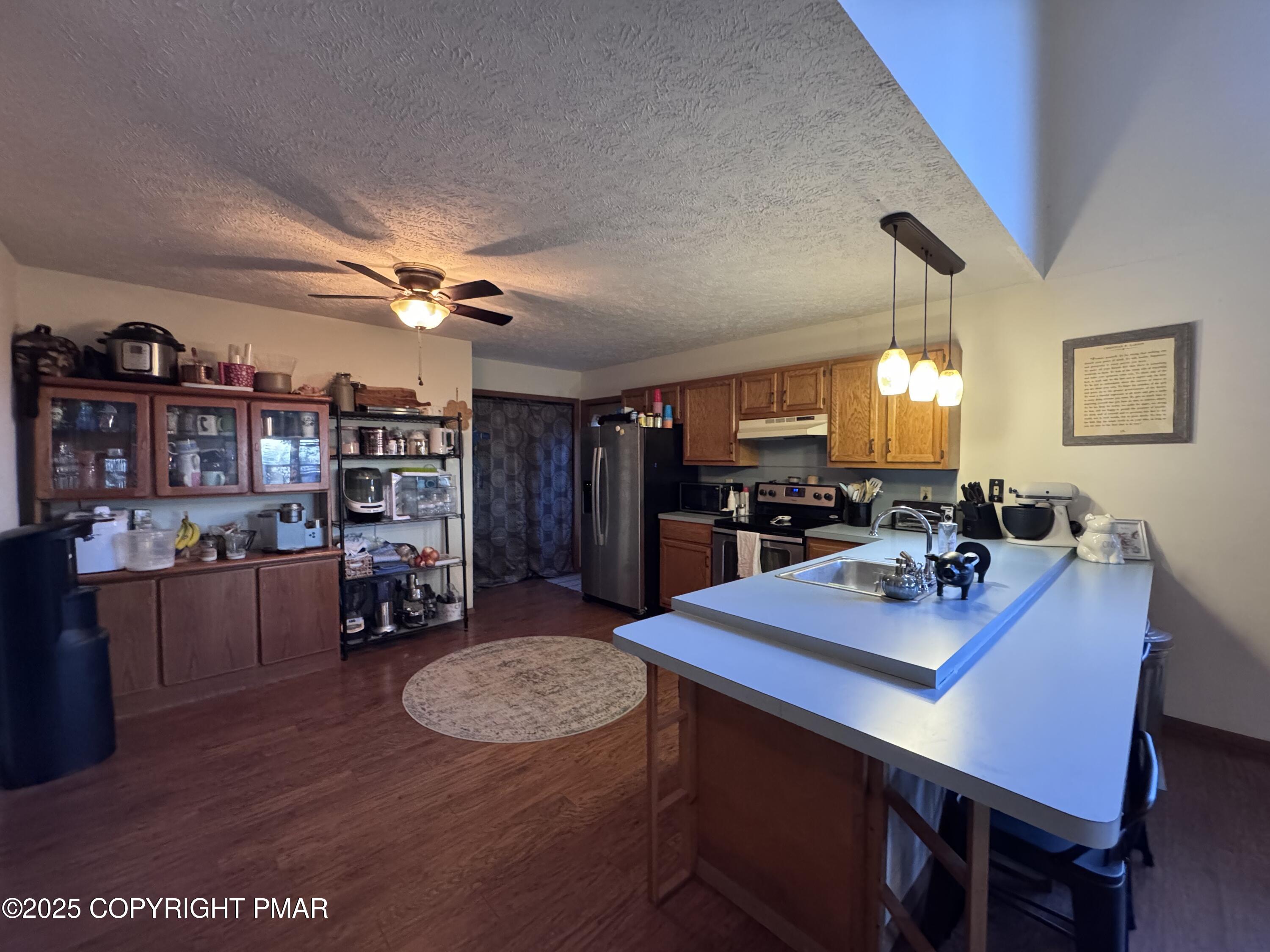 67 Seneca Road Albrightsville, PA 18210 - Photo 12 of 52 a view of a dining room with furniture and a potted plant