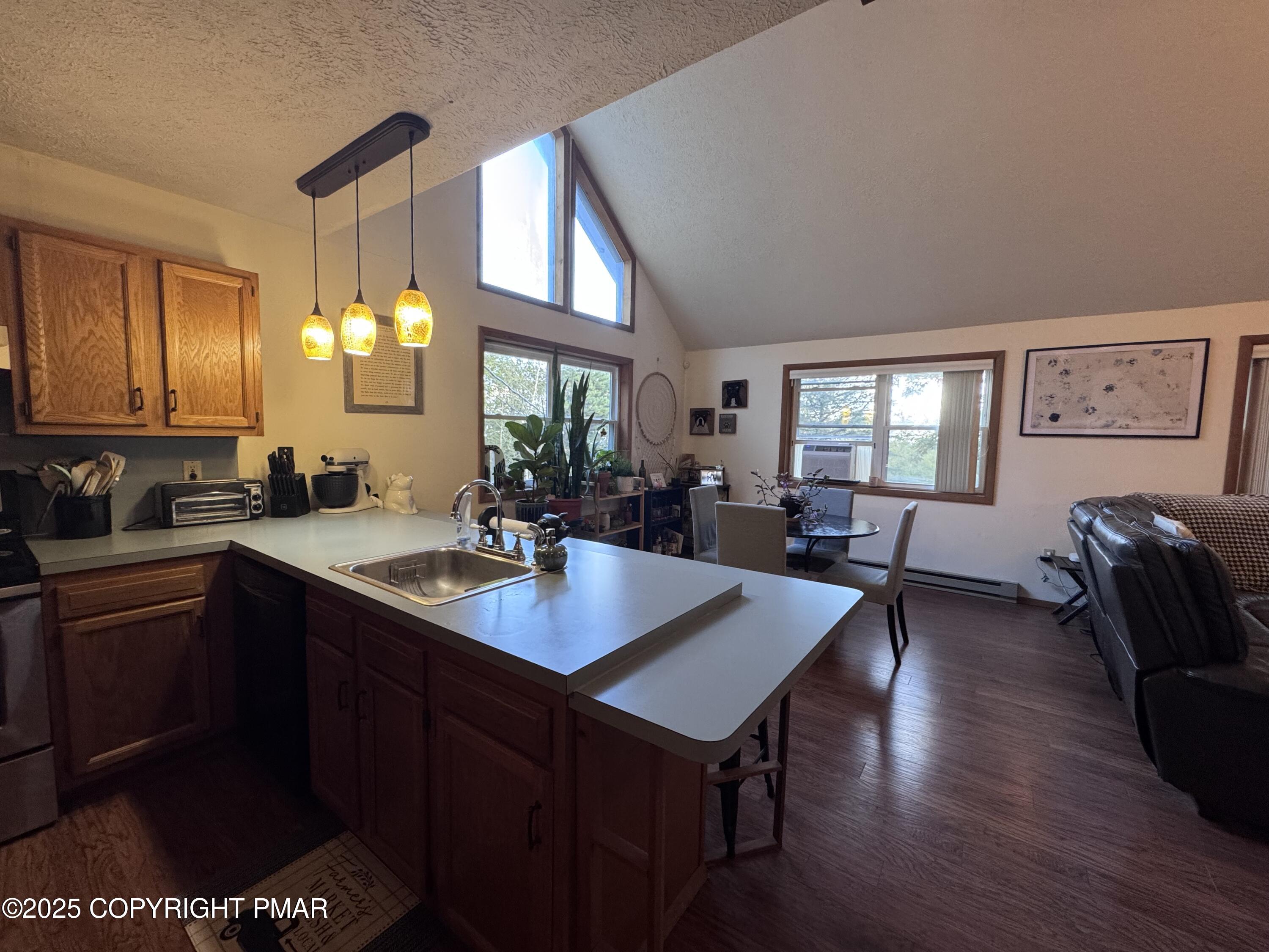 67 Seneca Road Albrightsville, PA 18210 - Photo 21 of 52 a kitchen with sink cabinets and dining table