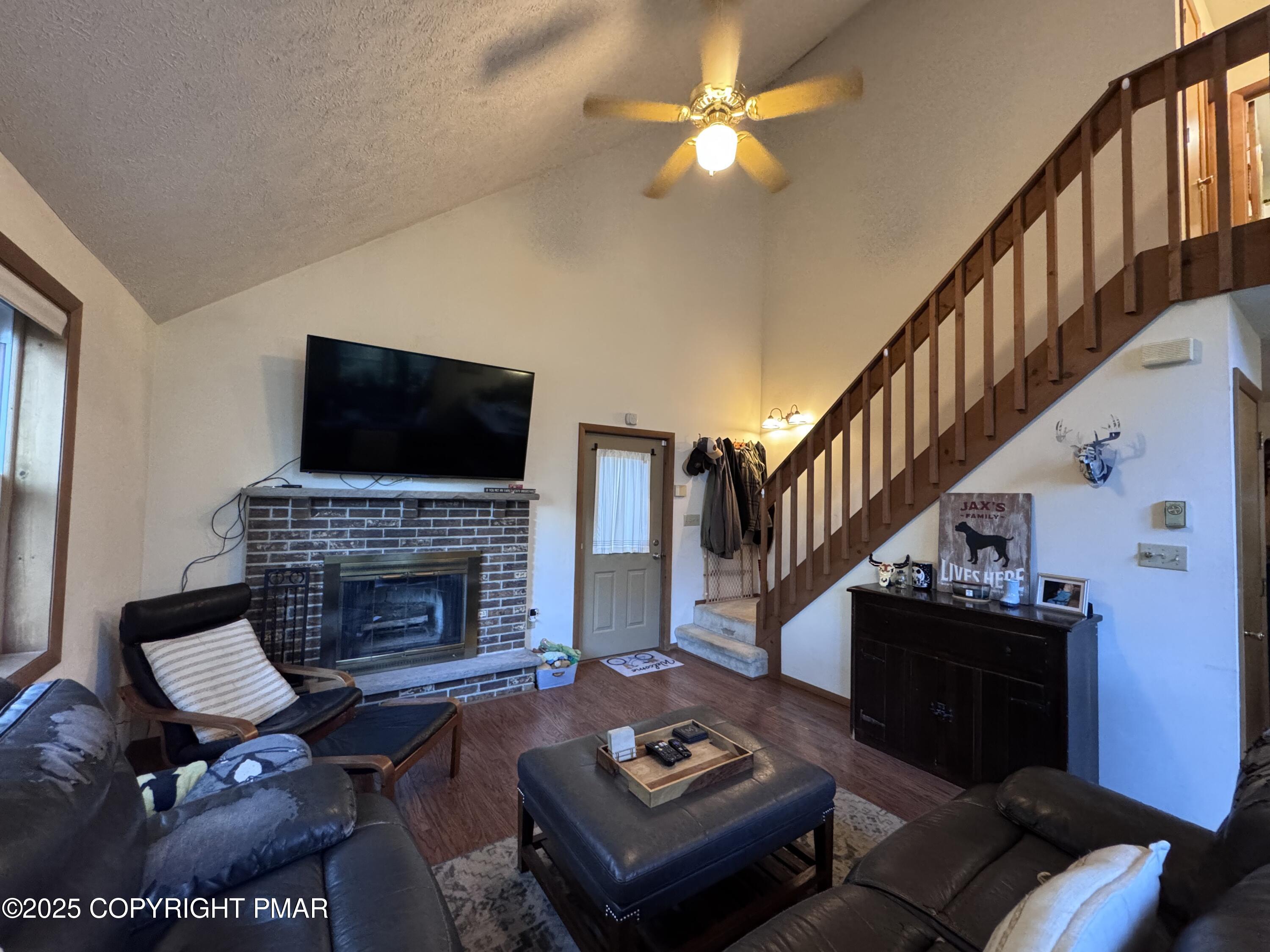 67 Seneca Road Albrightsville, PA 18210 - Photo 23 of 52 a living room with furniture fireplace and a flat screen tv