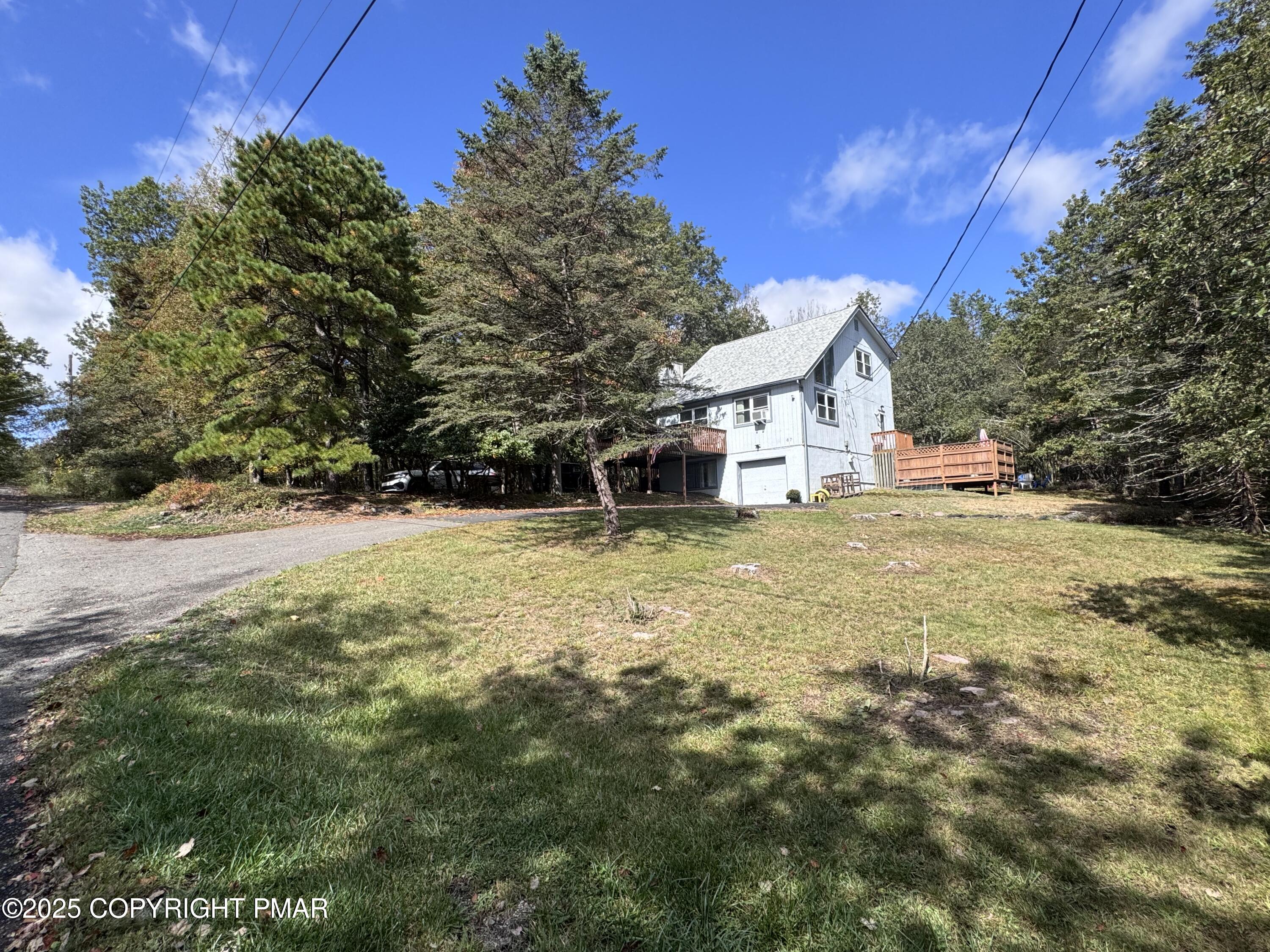 67 Seneca Road Albrightsville, PA 18210 - Photo 44 of 52 a view of a house with a yard