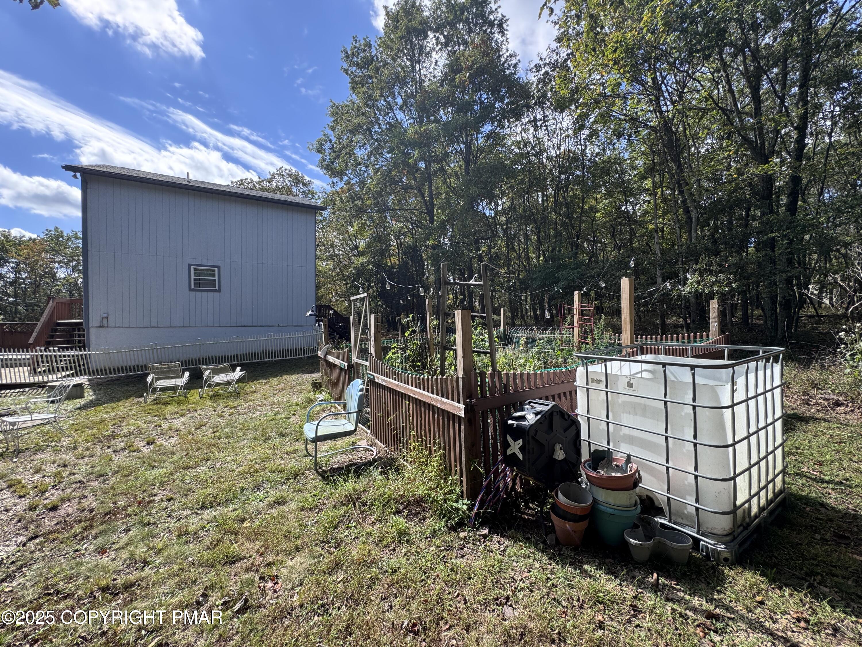 67 Seneca Road Albrightsville, PA 18210 - Photo 47 of 52 a view of backyard with wooden fence and large trees