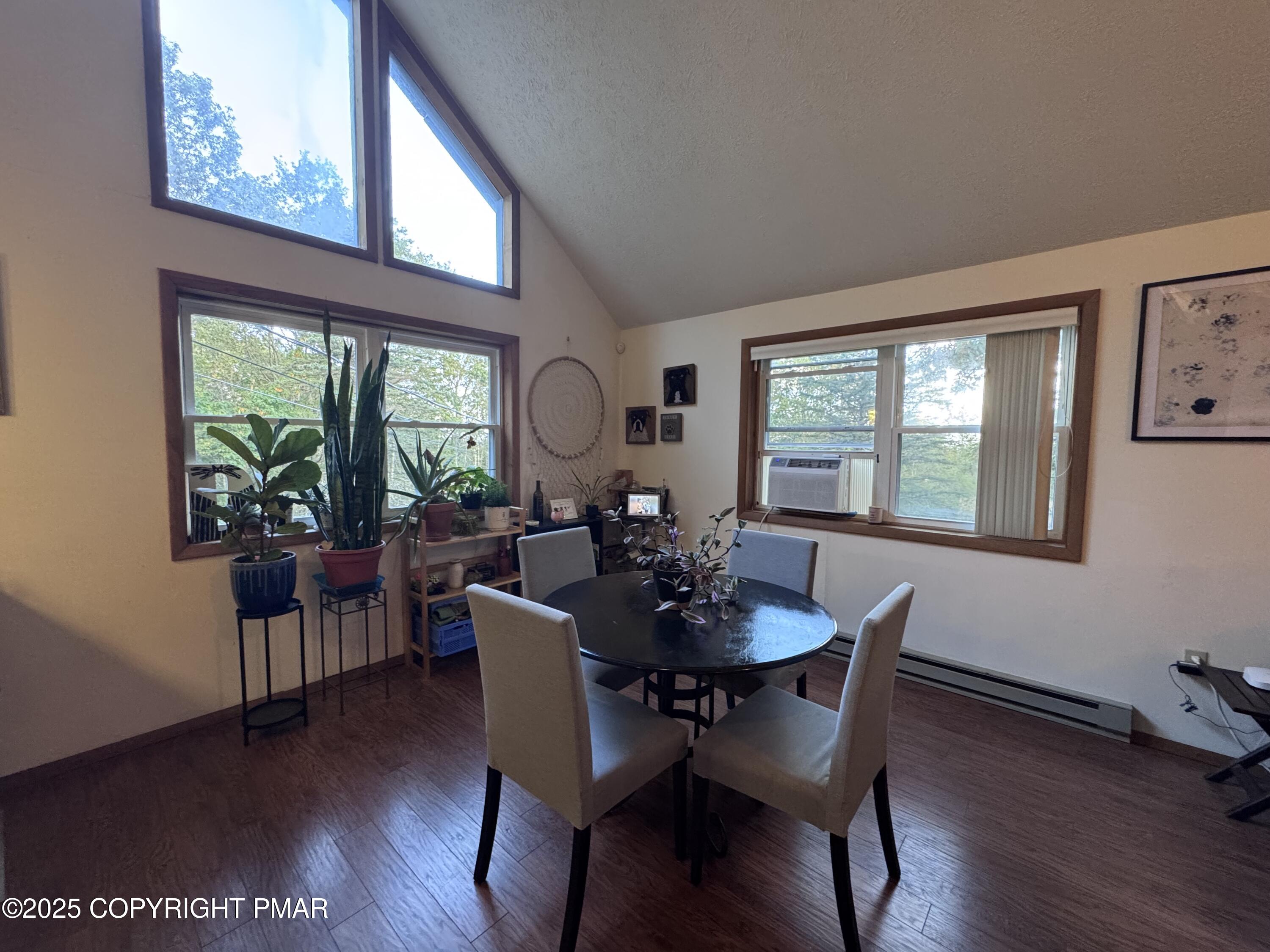 67 Seneca Road Albrightsville, PA 18210 - Photo 8 of 52 a dining room with furniture a window and wooden floor