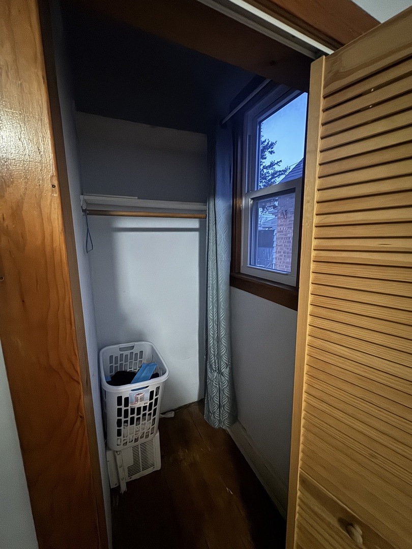 3945 West 55th Place Chicago, IL 60629 - Photo 7 of 21 a room with furniture and dryer