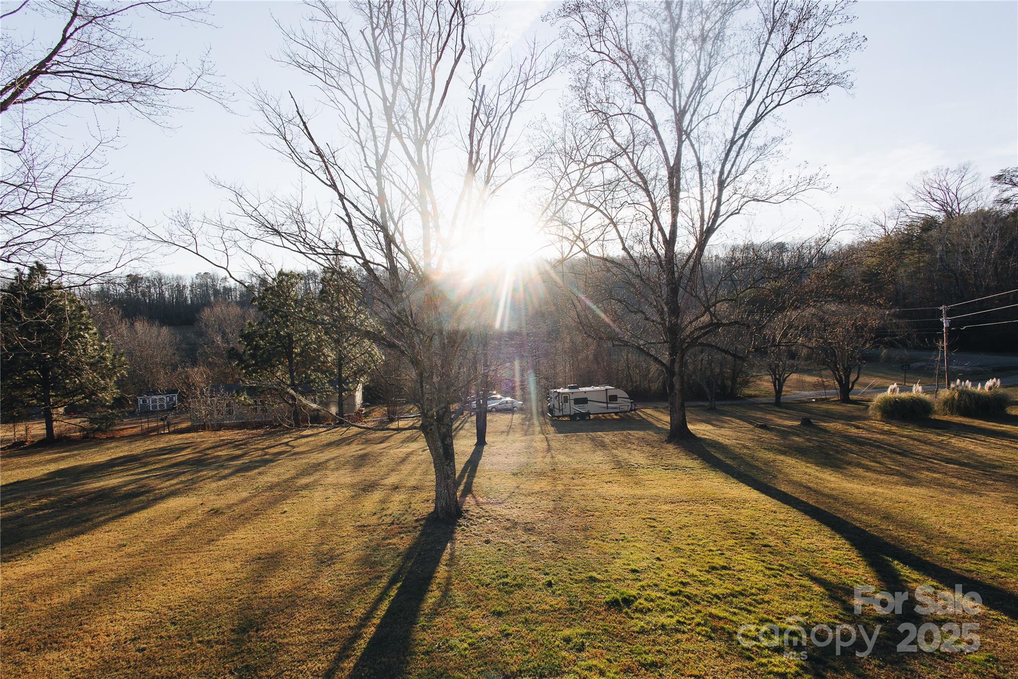 530 Toney Road Marion, NC 28752 - Photo 13 of 48 a view of a yard with snow on the road