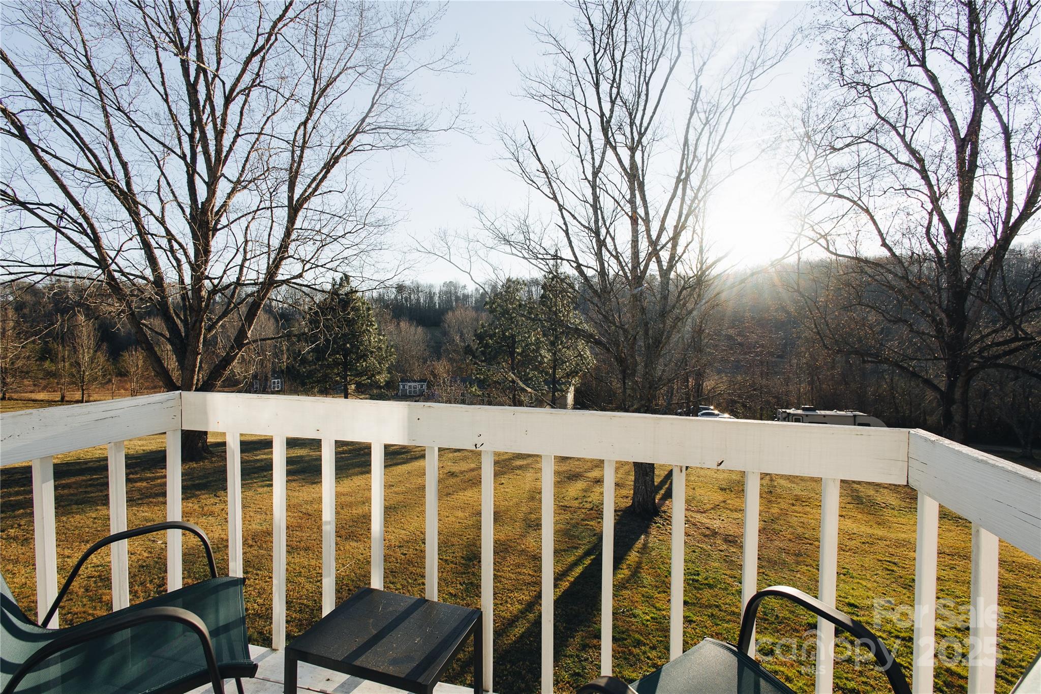 530 Toney Road Marion, NC 28752 - Photo 14 of 48 a view of a blue house with a yard