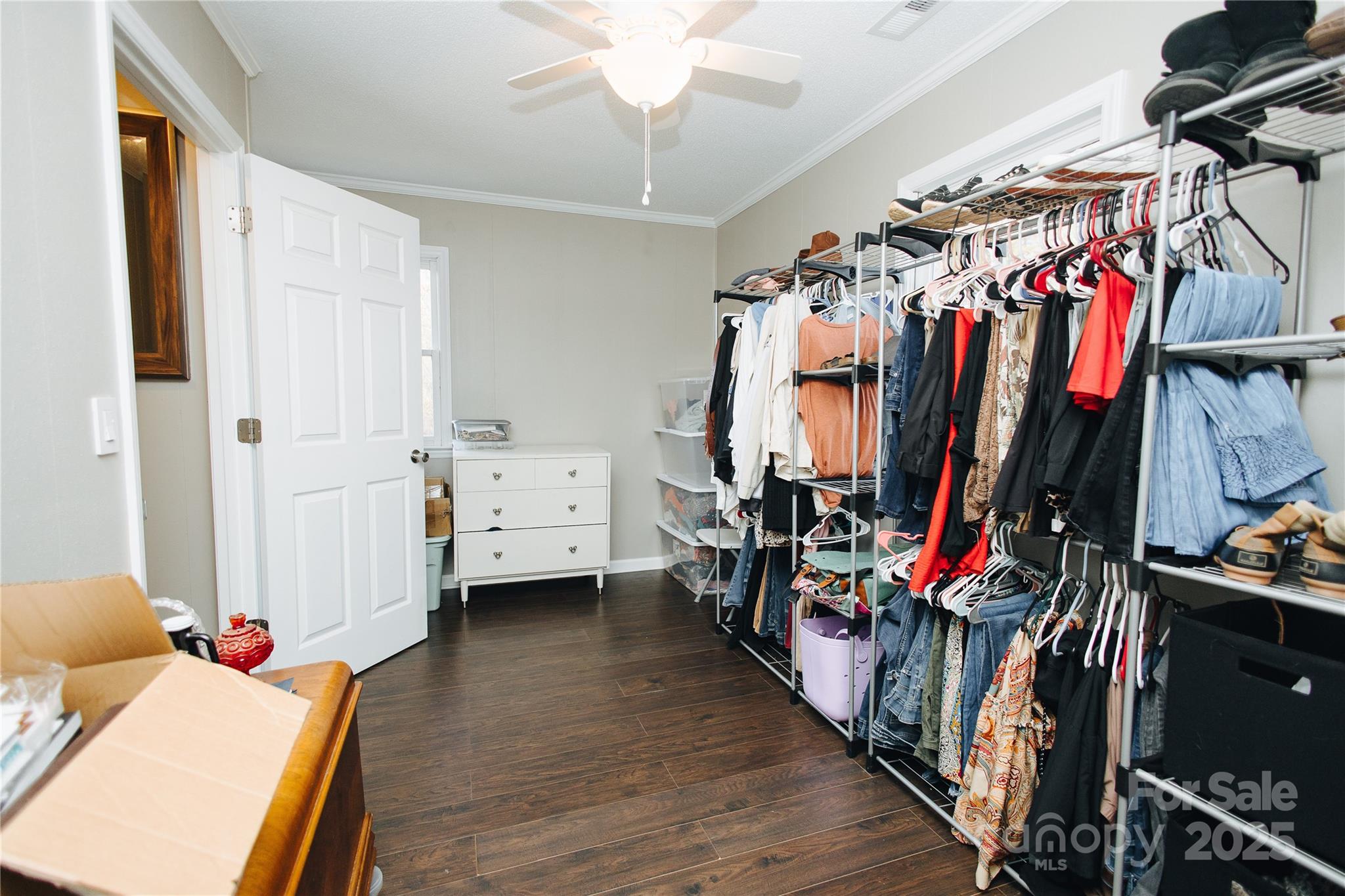 530 Toney Road Marion, NC 28752 - Photo 22 of 48 a view of walk in closet with clothes and shoes