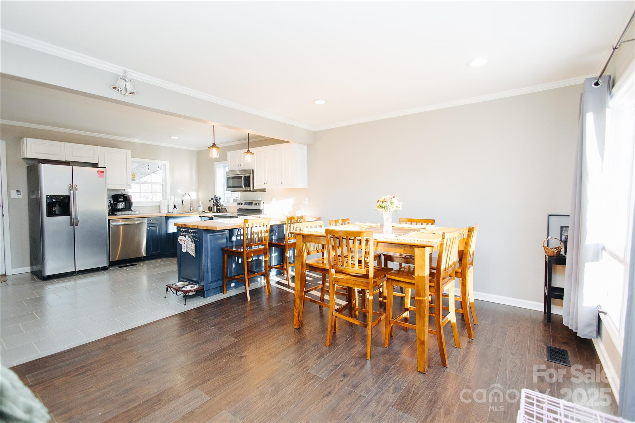 530 Toney Road Marion, NC 28752 - Photo 25 of 48 a view of a dining room with furniture and wooden floor