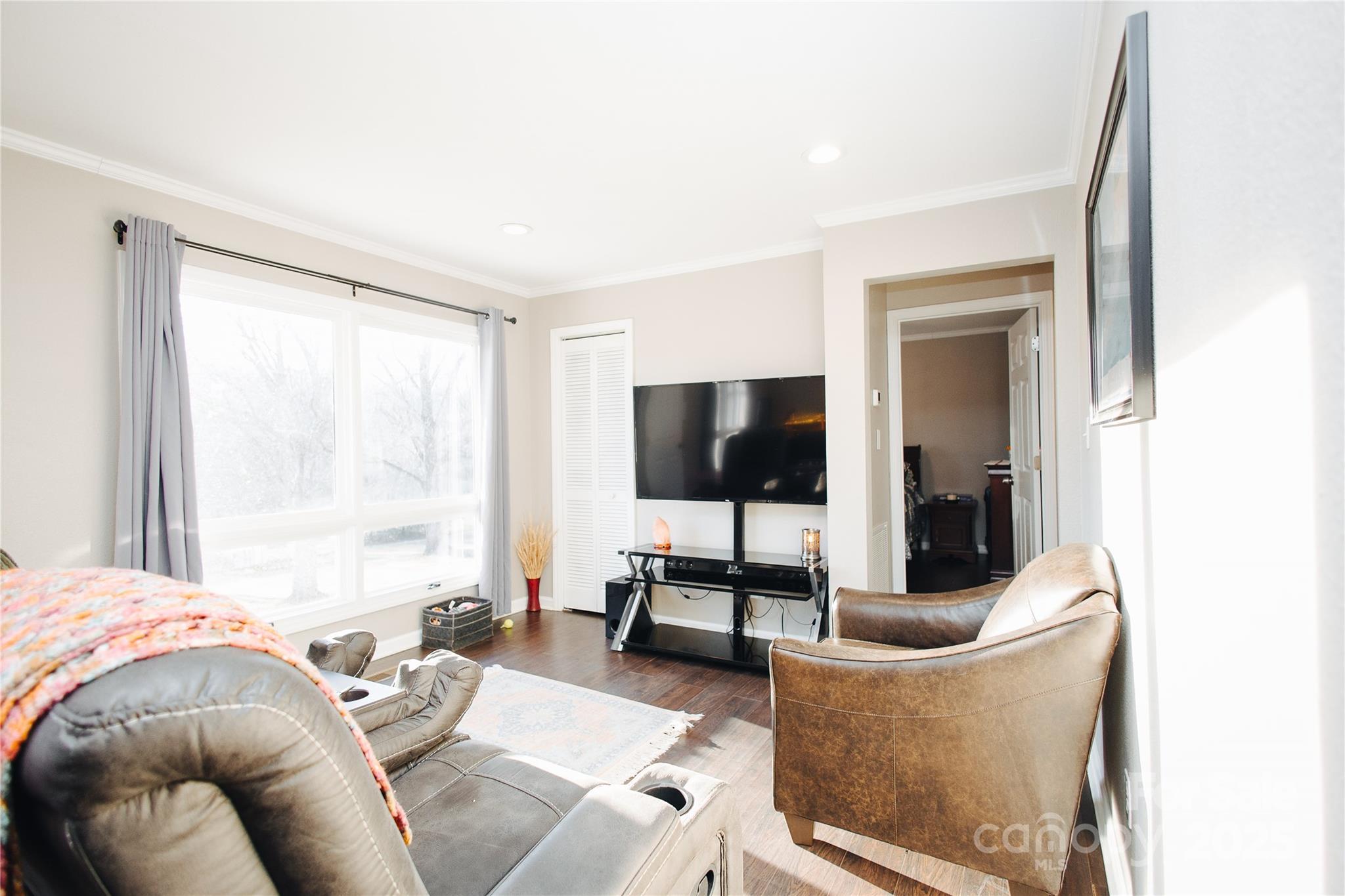 530 Toney Road Marion, NC 28752 - Photo 28 of 48 a living room with furniture and a flat screen tv
