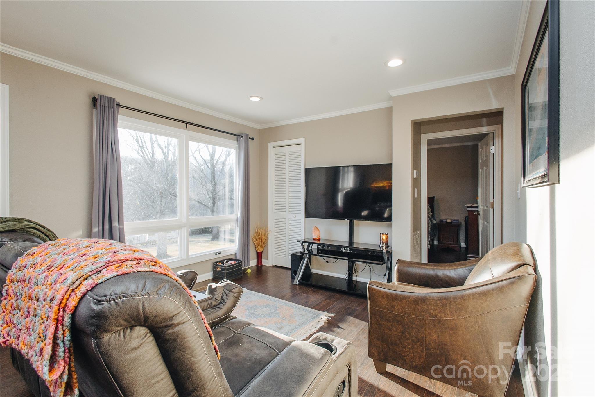 530 Toney Road Marion, NC 28752 - Photo 29 of 48 a living room with furniture and a flat screen tv