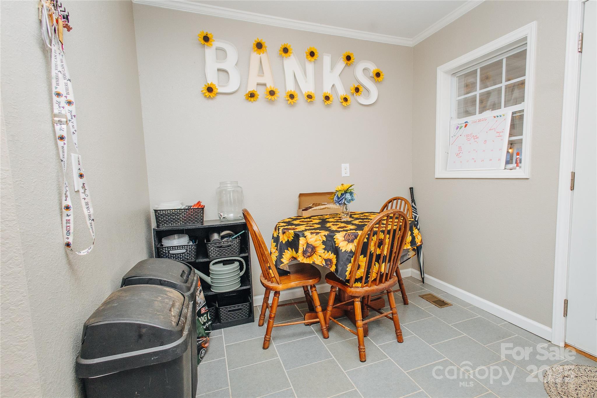 530 Toney Road Marion, NC 28752 - Photo 32 of 48 a dining room with furniture and a window