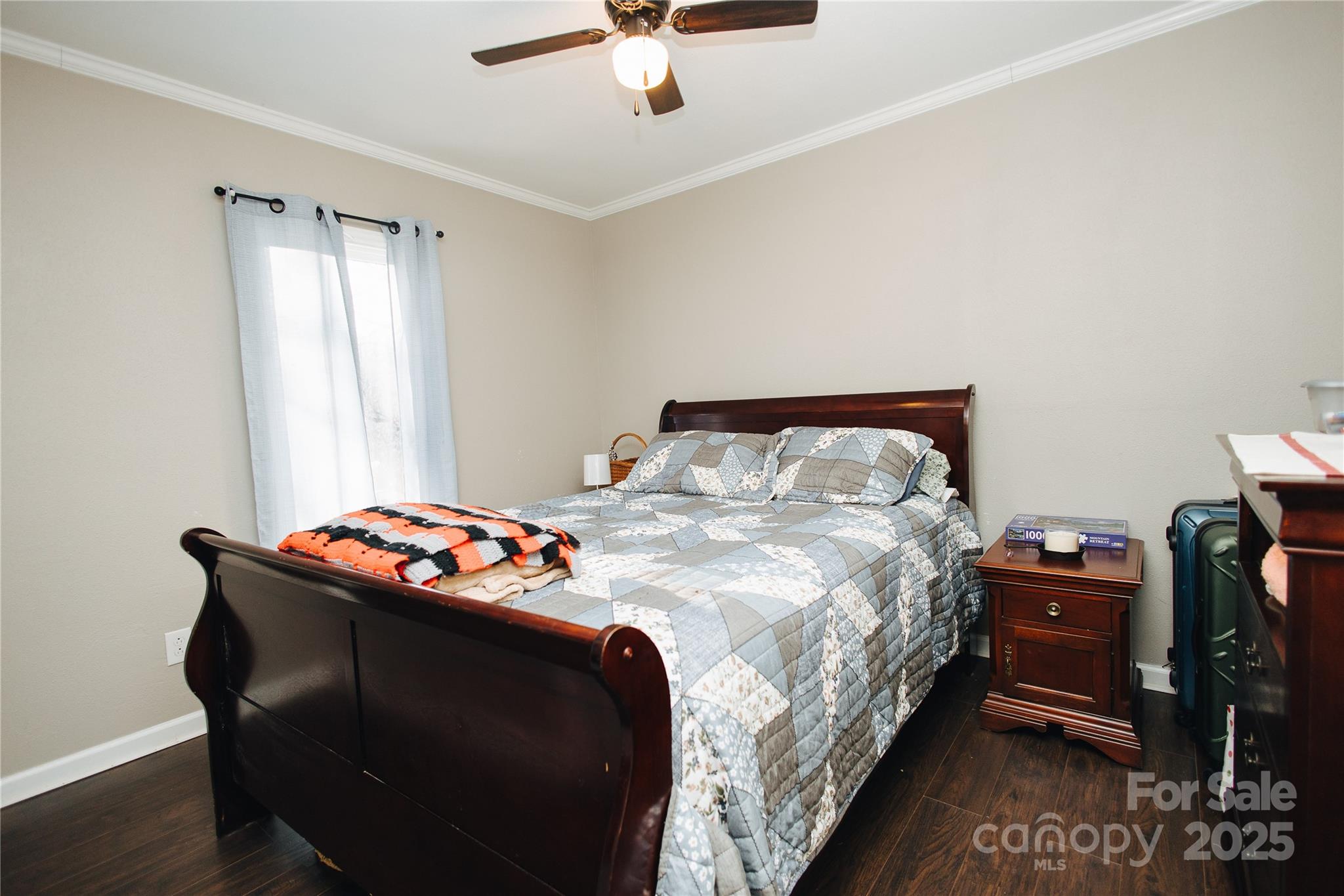 530 Toney Road Marion, NC 28752 - Photo 39 of 48 a bedroom with bed and a window