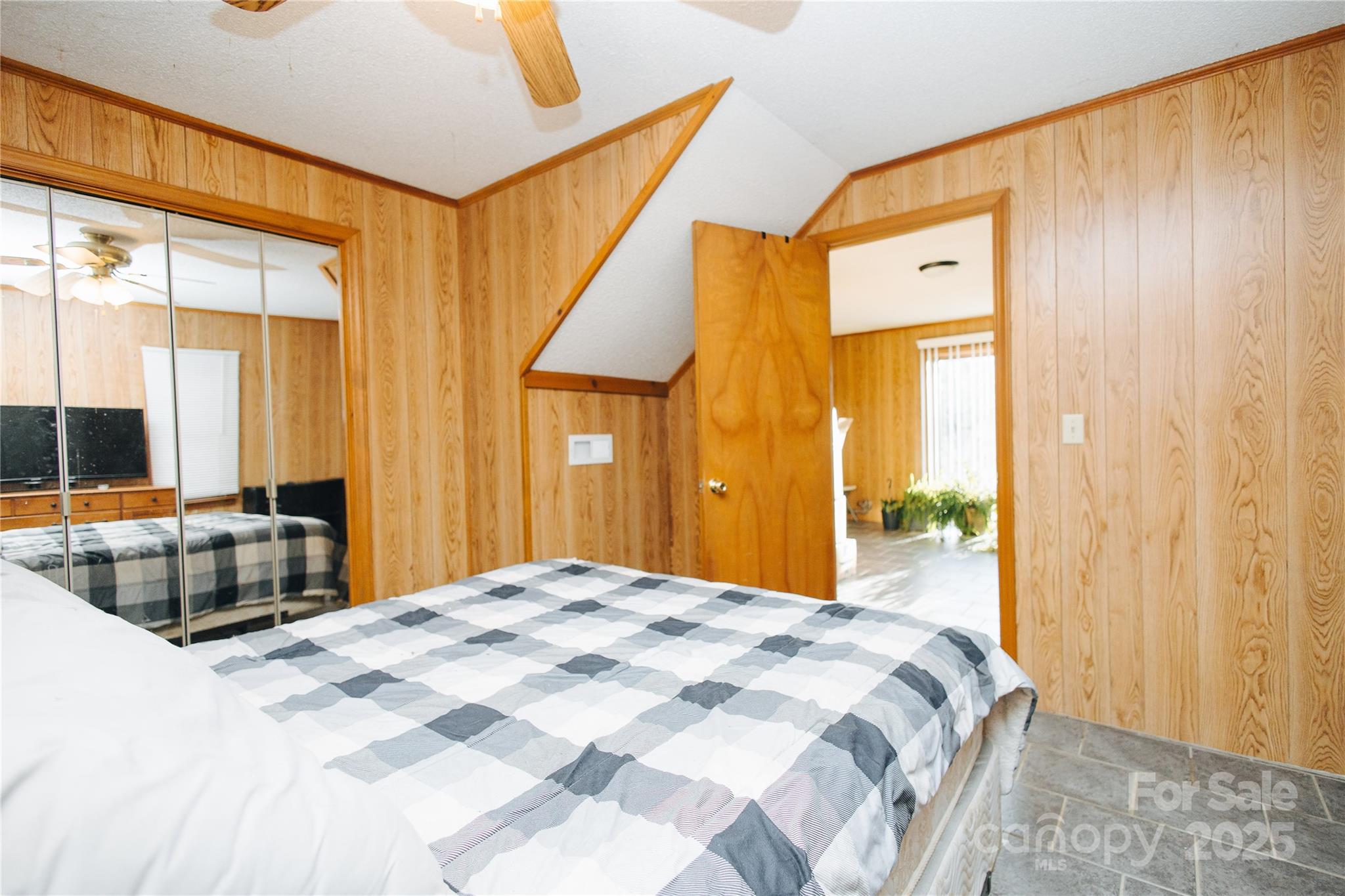 530 Toney Road Marion, NC 28752 - Photo 48 of 48 a bedroom with a bed and a large window