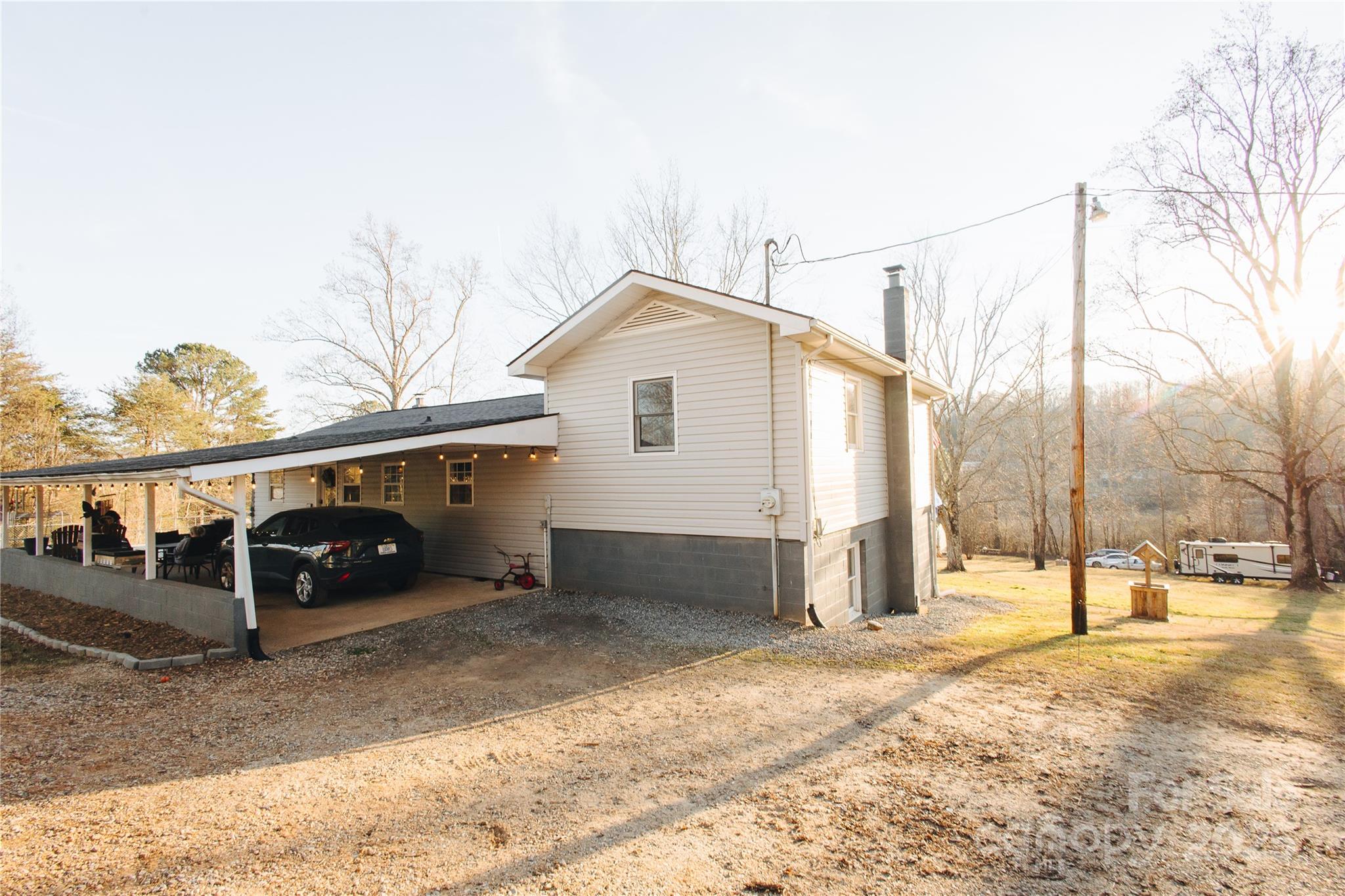 530 Toney Road Marion, NC 28752 - Photo 9 of 48 a view of a house with a snow in the yard