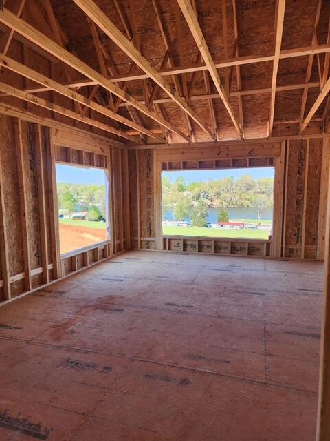 6990 Horseshoe Bend Road Goodview, VA 24095 - Photo 14 of 18 a view of a room with wooden walls and stairs