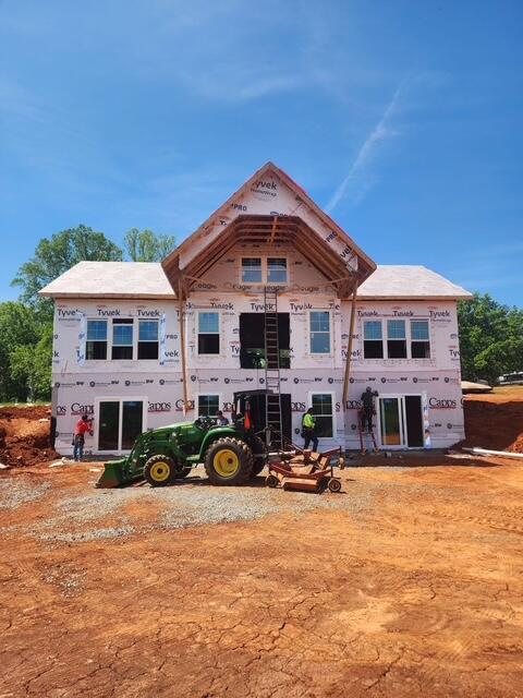 6990 Horseshoe Bend Road Goodview, VA 24095 - Photo 7 of 18 a front view of a building with cars parked