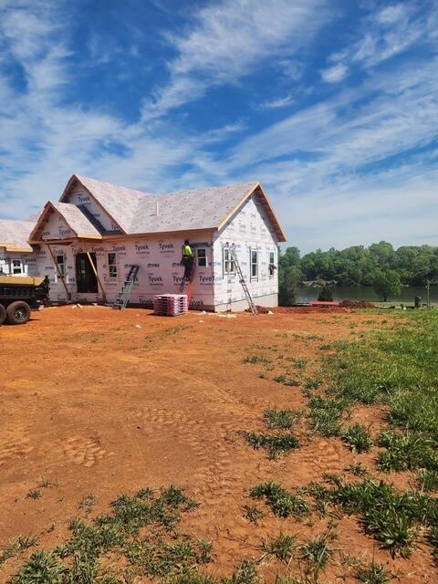6990 Horseshoe Bend Road Goodview, VA 24095 - Photo 9 of 18 a view of a house with a yard
