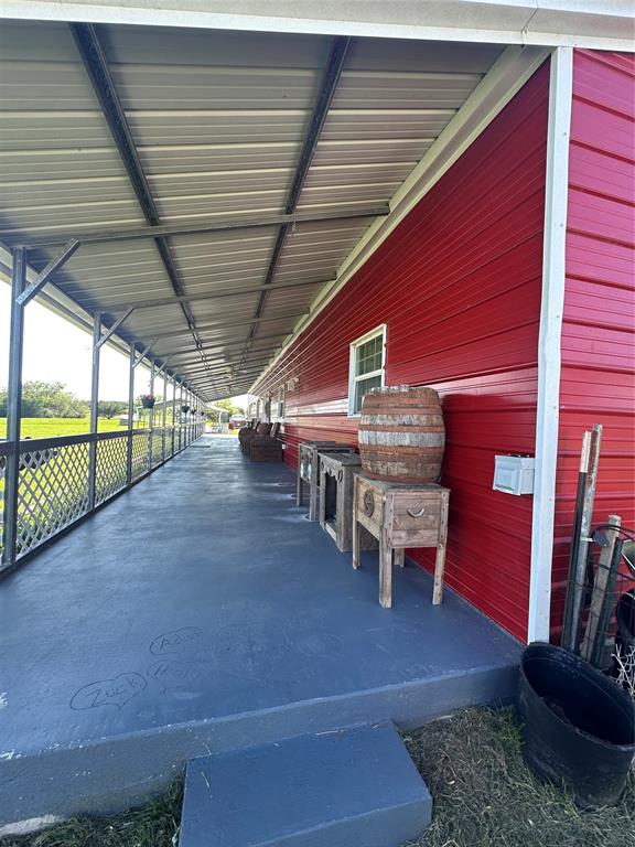 134-1112 1112th Rio Vista, TX 76093 - Photo 15 of 25 a view of a porch with furniture and wooden floor