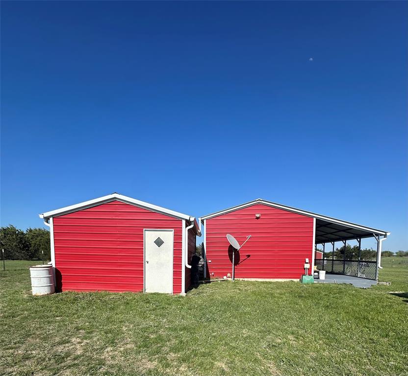 134-1112 1112th Rio Vista, TX 76093 - Photo 17 of 25 a front view of a house with a yard