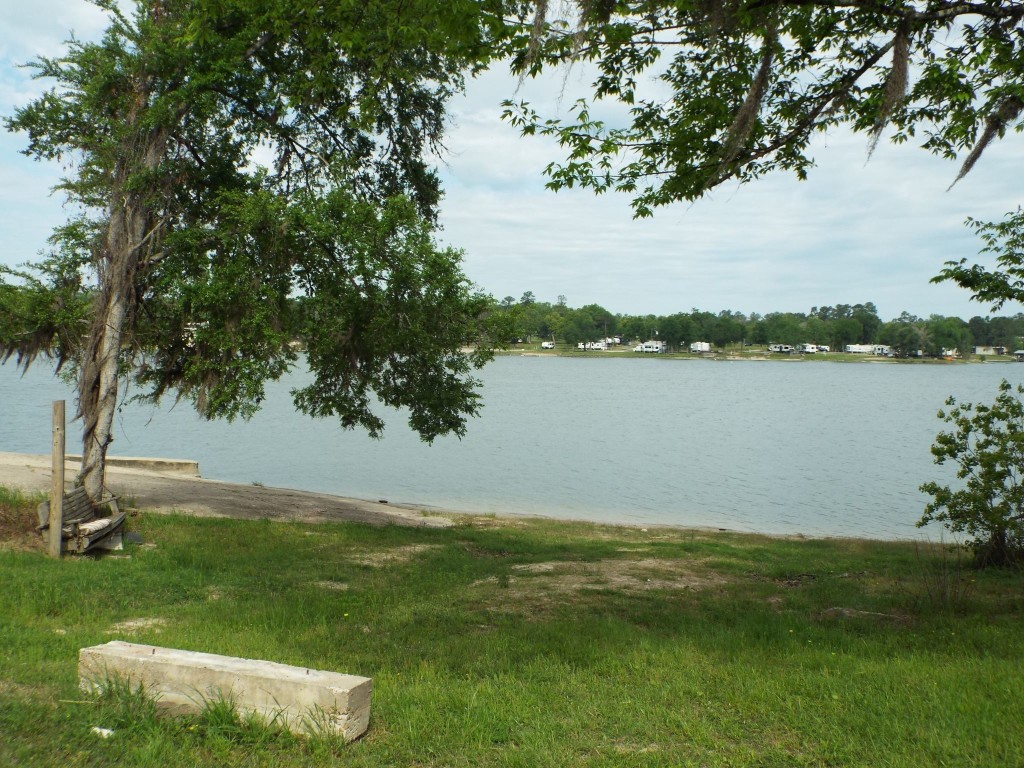 Lot 34 Dogwood Road Huntsville, TX 77320 - Photo 11 of 23 a view of a lake with a big yard