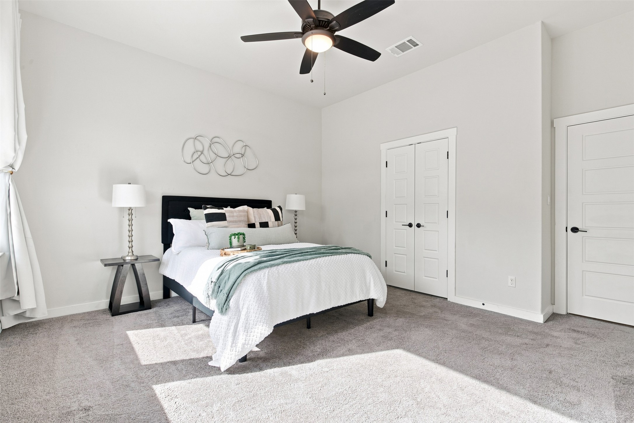 336 Berkeley Place Georgetown, TX 78628 - Photo 16 of 36 High ceilings and soft carpeting create a serene atmosphere in this restful bedroom.