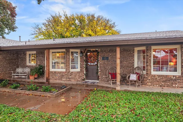 front view of a house with garden