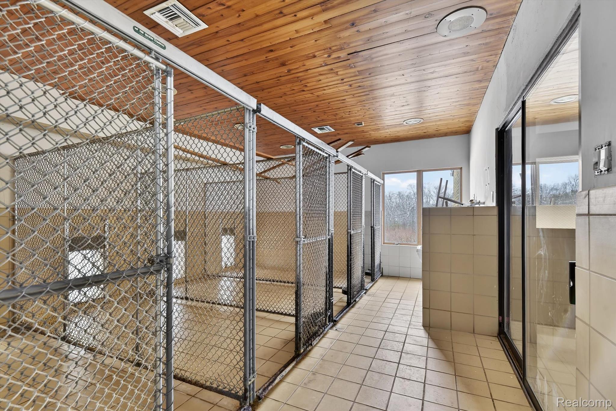 2551 Patterson Lk Road Pinckney, MI 48169 - Photo 78 of 95 Kennels with Dog Door to Outdoor Kennels