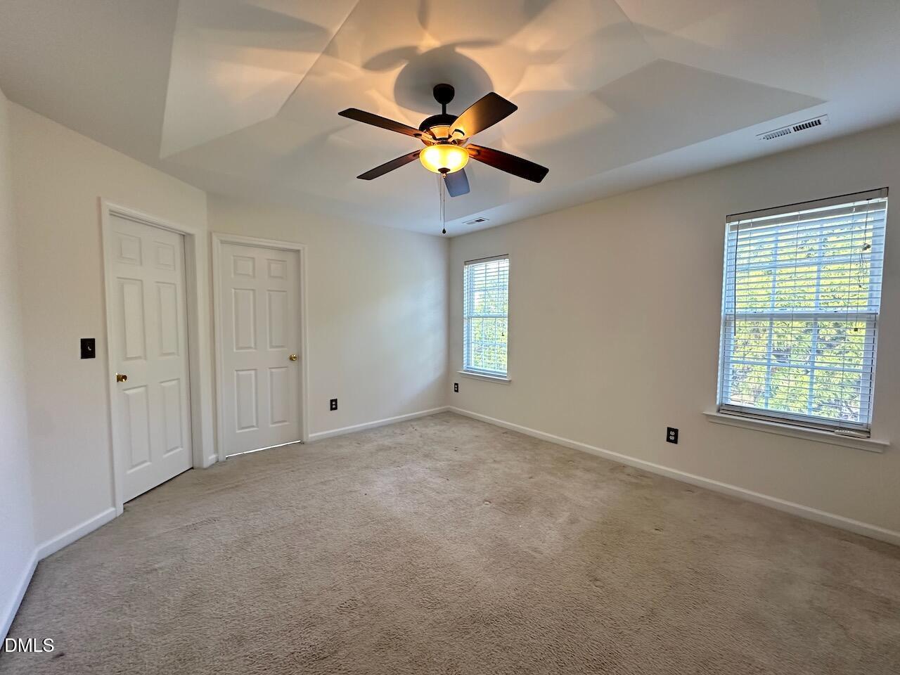 5413 Kissimmee Lane Raleigh, NC 27616 - Photo 14 of 26 a view of workspace with window and chandelier fan
