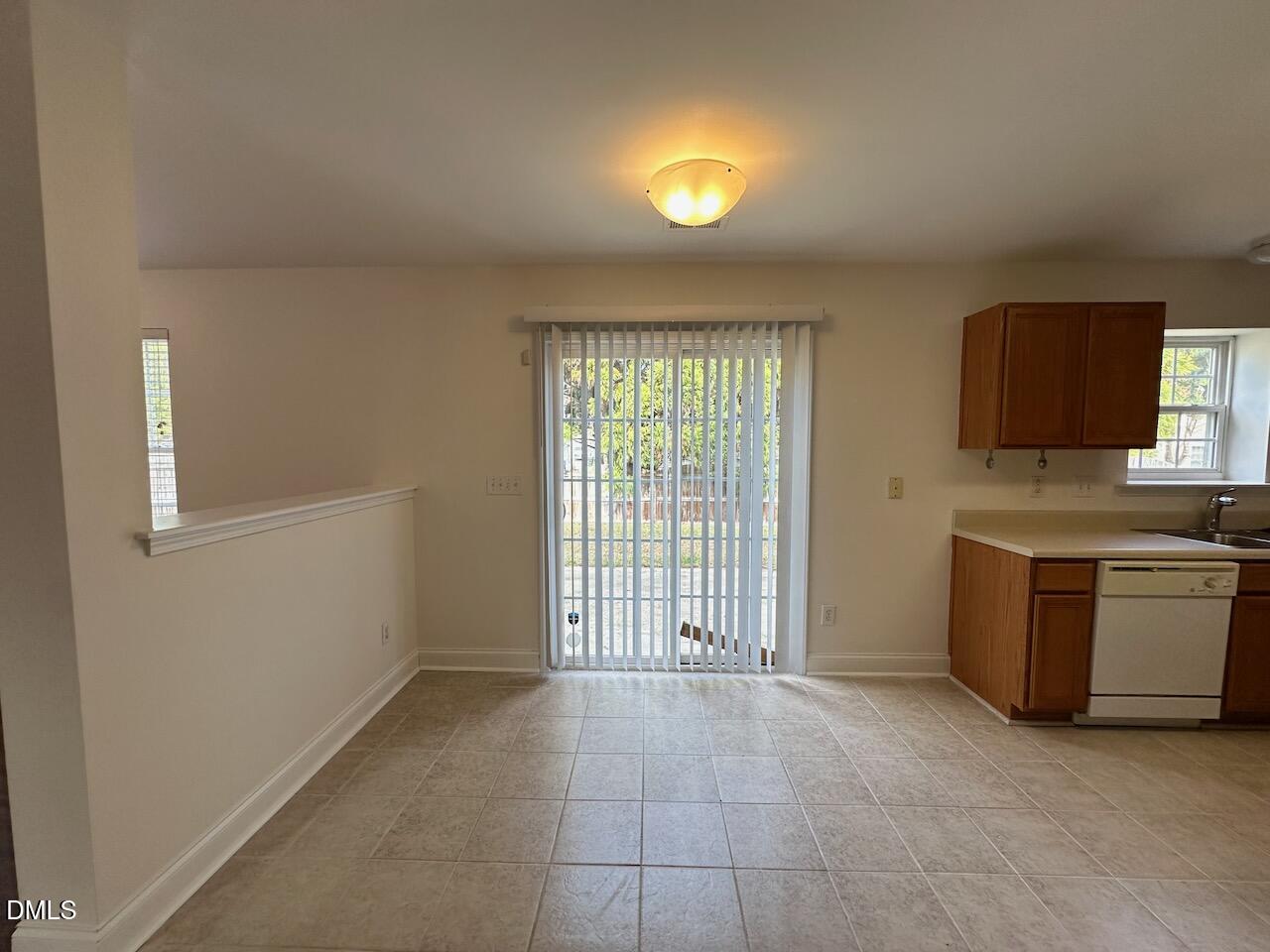 5413 Kissimmee Lane Raleigh, NC 27616 - Photo 6 of 26 a view of an empty room with a window