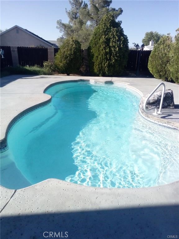 432 Vista Ridgecrest, CA 93555 - Photo 2 of 4 a view of swimming pool from a yard