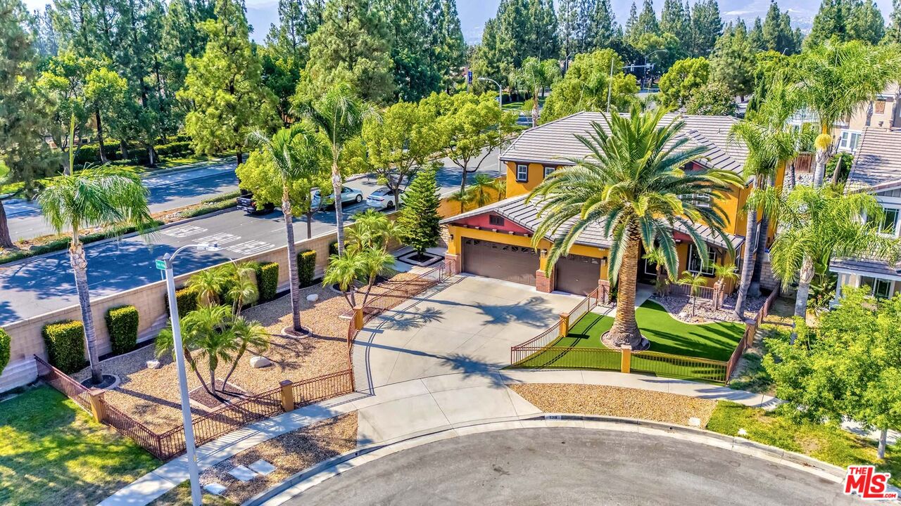 11318 Fitzpatrick Drive Rancho Cucamonga, CA 91730 - Photo 24 of 24 a view of a backyard with plants and a garden