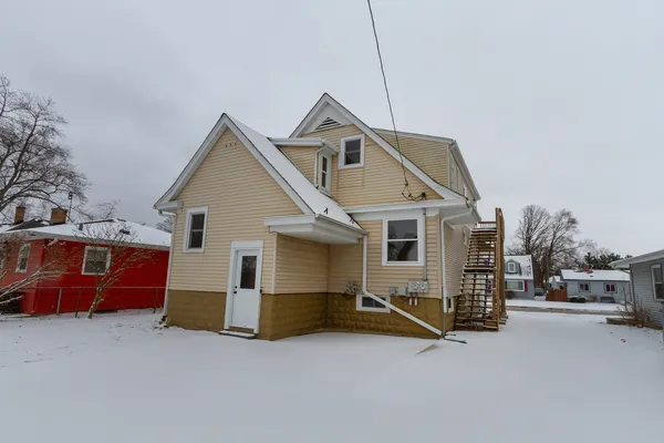 a view of a house with a big yard