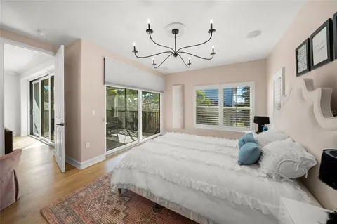 a room with stainless steel appliances kitchen island granite countertop furniture and a kitchen view