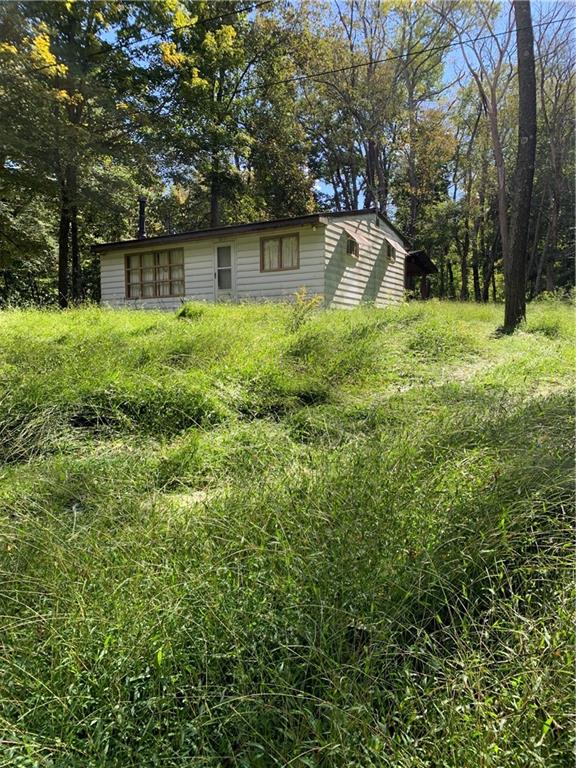 119 Lake Road Addison, PA 15411 - Photo 6 of 16 a view of swimming pool with a yard