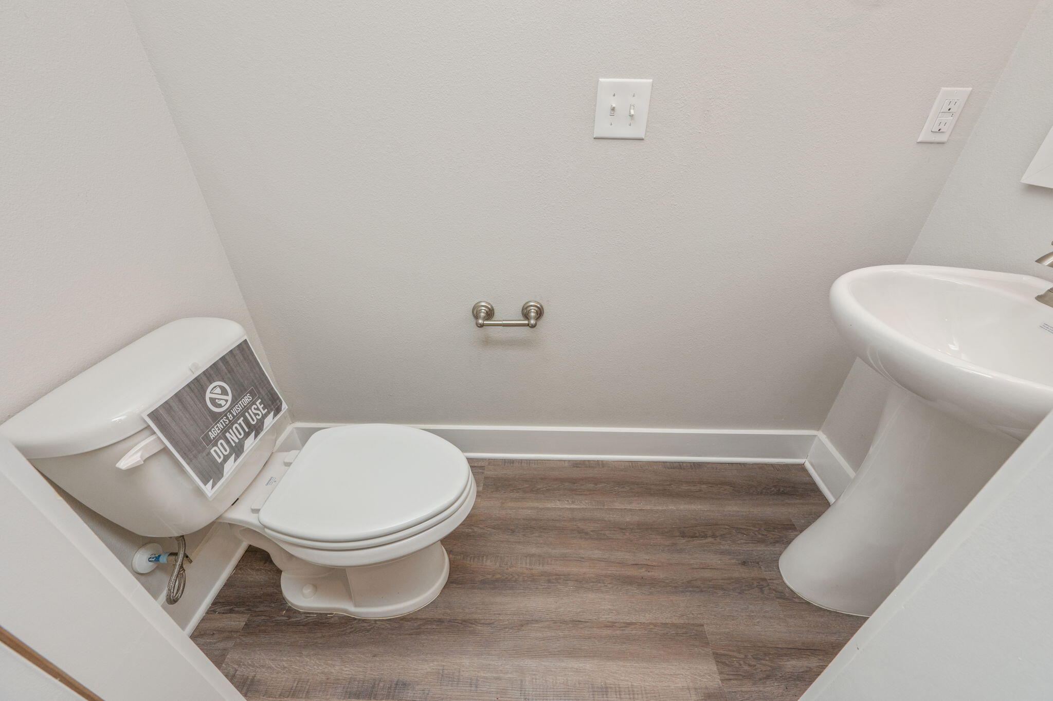 275 North Sand Palm Road, Unit 167VISTA Freeport, FL 32439 - Photo 15 of 40 a white toilet sitting next to a toilet