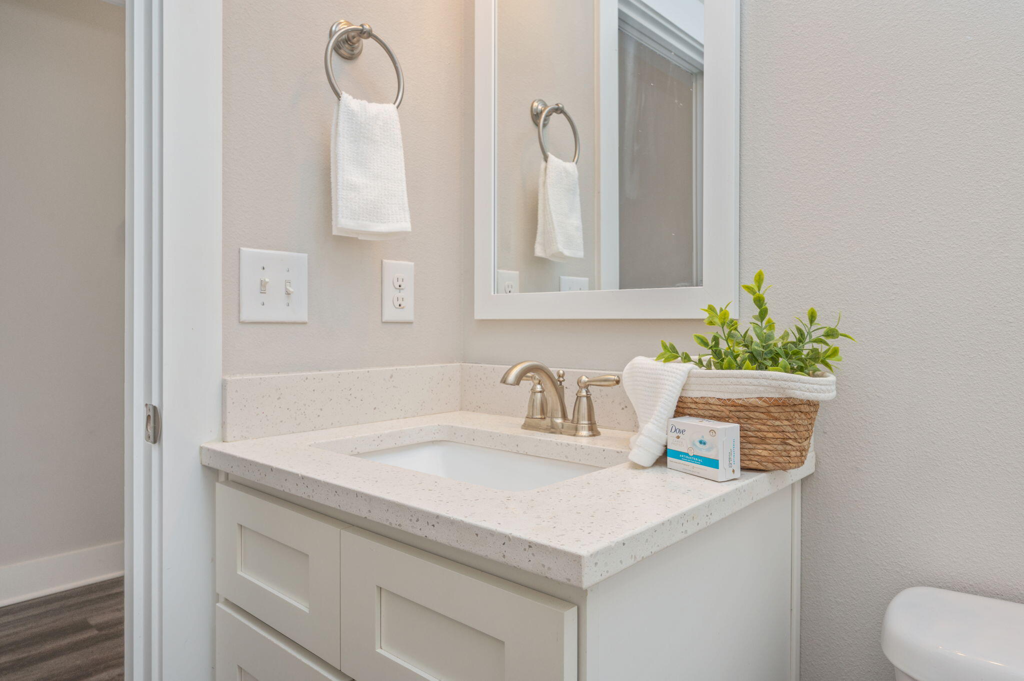 275 North Sand Palm Road, Unit 167VISTA Freeport, FL 32439 - Photo 20 of 40 a bathroom with a sink a vanity and a mirror