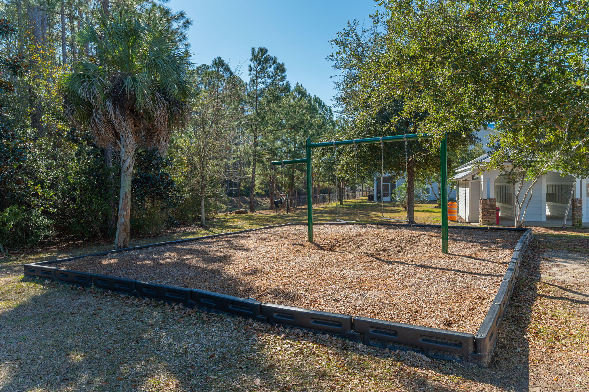 275 North Sand Palm Road, Unit 167VISTA Freeport, FL 32439 - Photo 39 of 40 a view of a backyard with wooden fence